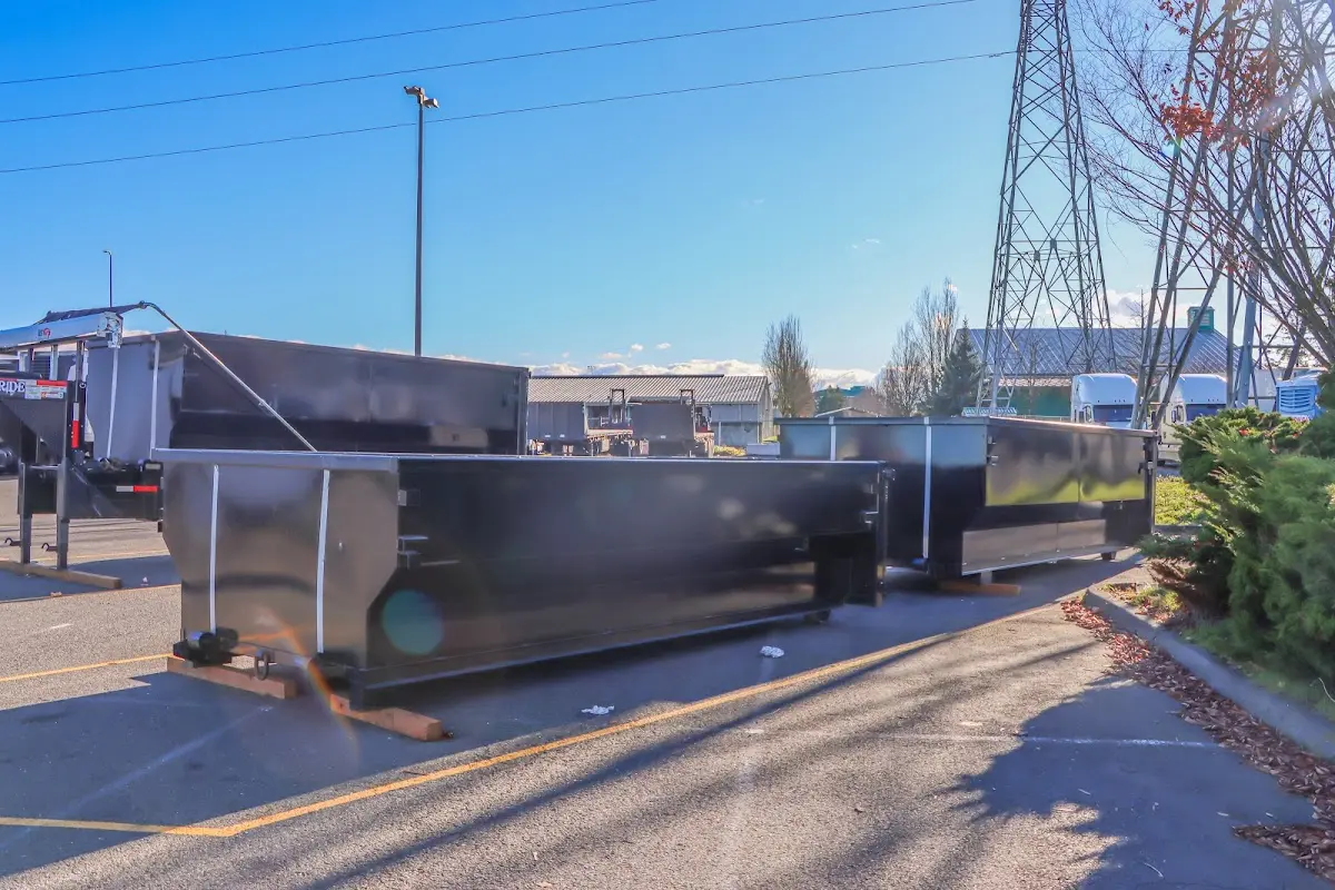 Roll-off dumpster ready for waste disposal at job site for 2 Yard Dumpster Rental in Union Grove